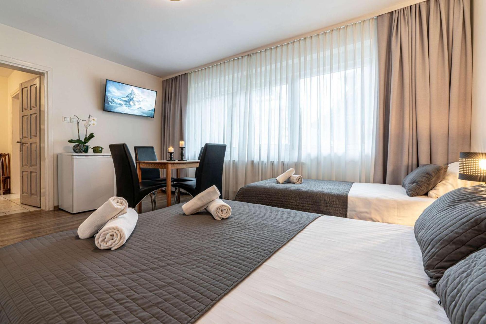 Liberta Inn - Pokoje Goscinne Zakopane Rom bilde